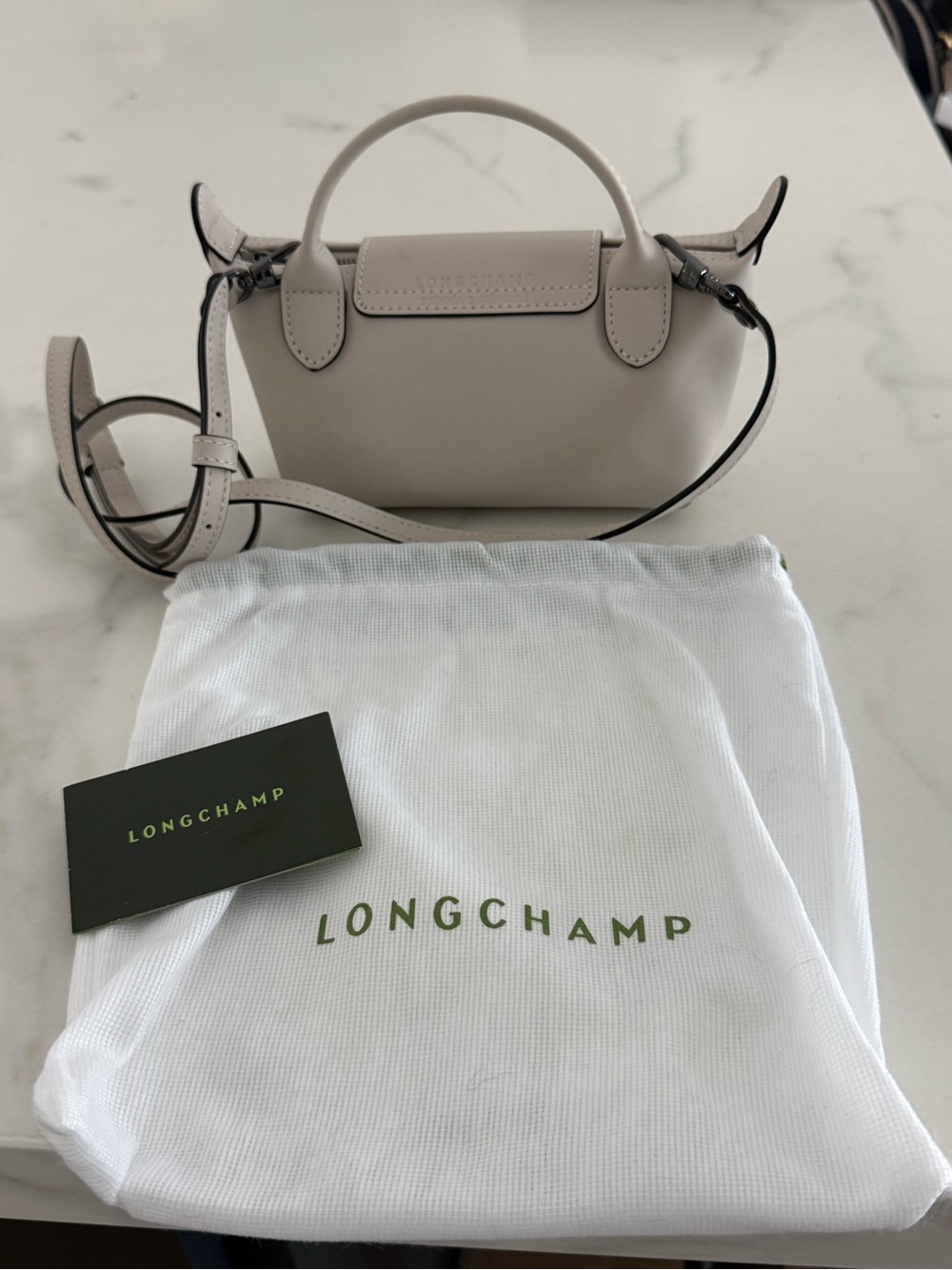Longchamp Extra Small Le Pilage leather clutch with strap in light beig - Picture 4 of 9